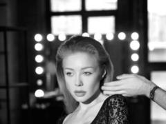 Tina Karol in a sheer body with a deep neckline burst into a squishy photo
