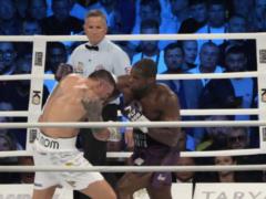 Usyk admitted what he would do if the referee started counting the knockdown after Dubois hit below the belt