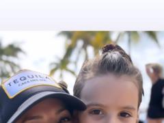 Eva Longoria in a white bikini walked along the beach with her grown son