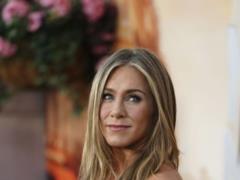 Jennifer Aniston amused the Internet with her childhood photo, which she repeated 52 years later