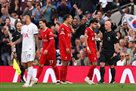 Liverpool with two cards of hearts, losing a draw against Tottenham