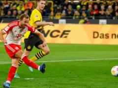 Bayern beat Borussia Dortmund thanks to Kane s hat-trick