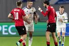 Scotland suffered a defeat away to Georgia, but gave Spain the same first place in Group A
