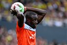 Mendi sued Manchester City over unpaid wages