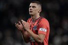 Mykolenko plays for Pershev Khvylin against Manchester City