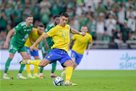 Ronaldo s goal from the penalty spot brought Al-Nasr a victory over Al-Ahli