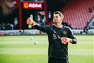 Manchester United extend contract with Tom Guiton