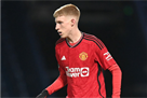 Ukrainian junior midfielder Baumann signed a professional contract from Manchester United