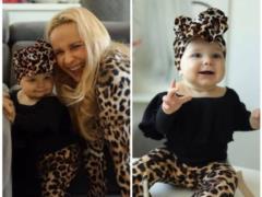 Liliya Rebrik enchanted a young 9-month-old daughter in a bright leopard print