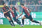 Rumanian businessman adding Genoa