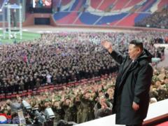 Probable heir: Kim Jong-un unexpectedly showed two more members of his family