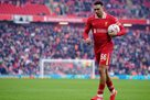Alexander-Arnold turns to the Liverpool starting box for the match against Nottingham Forest