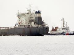 Frozen cargo ship with 17 passengers stuck in Canadian lake for days