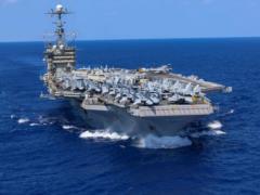 USS Harry Truman aircraft carrier has encountered a trading ship in the Mediterranean Sea