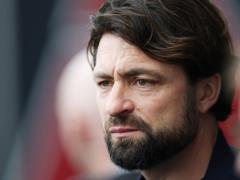 Russell Martin by licking the posad of the head coach Rangers