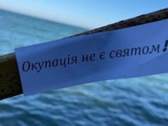 Крымские активисты провели акцию протеста в годовщину оккупации полуострова