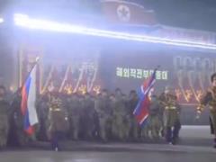 Военные КНДР шли на параде под флагом РФ: Украина иронично ответила
