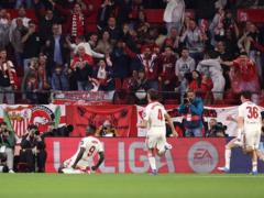 Seville claimed victory over Atletico in a tense finish