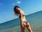 MamaRika showed elastic buttocks on the beach in Odessa