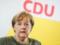 СМИ: Автомобиль Меркель закидали помидорами