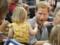 Prince Harry fun amused the girl who furtively enjoyed his popcorn