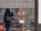 Нестримний голий протест: Мухарський знову роздягнувся, прикривши пеніс політичними гаслами