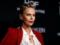 Charlize Theron with neckline to the navel appeared at the party and spoke sharply about motherhood