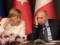 Пальто Путина впечатлило Меркель