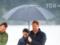 Pregnant Megan in sneakers with Prince Harry walked under an umbrella on the beach of New Zealand
