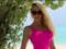 Seductive Olya Polyakova in a swimsuit boasted a tan and luxurious forms