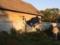 В Черновцах полицейский на BMW повис на заборе частного дома