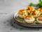 Вкусные фаршированные яйца с начинкой из авокадо и красной рыбы: рецепт закуски для праздничного стола